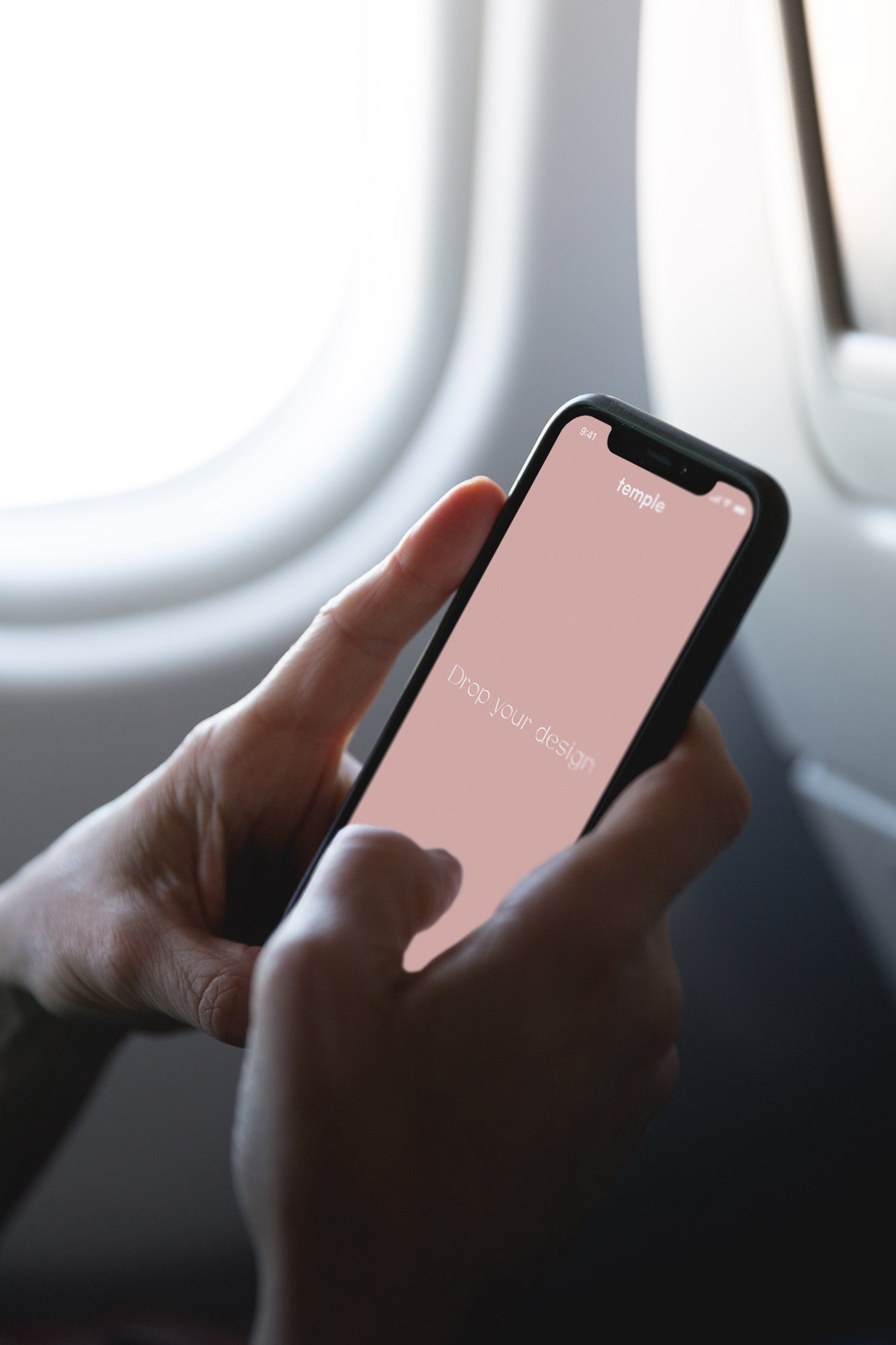 In Airplane With iPhone X Mockup